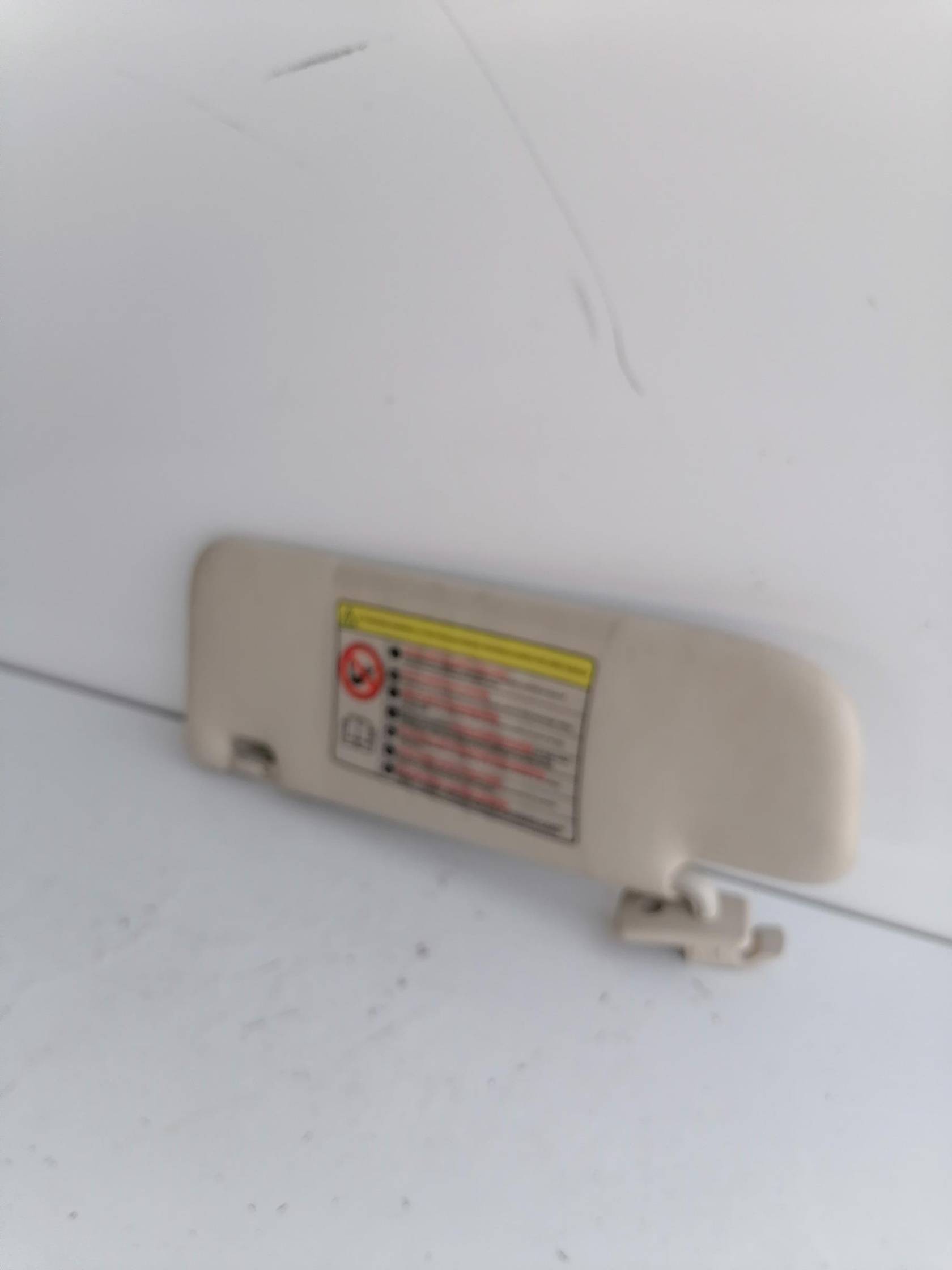 Aletta parasole parabrezza dx.